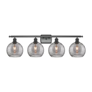 A thumbnail of the Innovations Lighting 516-4W 11 38 Athens Deco Swirl Vanity Matte Black / Light Smoke Deco Swirl