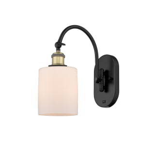 A thumbnail of the Innovations Lighting 518-1W-13-6 Cobbleskill Sconce Black Antique Brass / Matte White