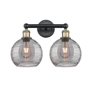 A thumbnail of the Innovations Lighting 616-2W 12 17 Athens Deco Swirl Vanity Black Antique Brass / Light Smoke Deco Swirl