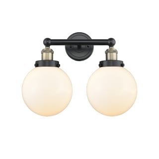 A thumbnail of the Innovations Lighting 616-2W-10-16-L Beacon Vanity Black Antique Brass / Matte White