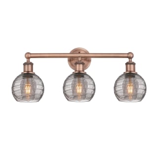 A thumbnail of the Innovations Lighting 616-3W 10 24 Athens Deco Swirl Vanity Antique Copper / Light Smoke Deco Swirl