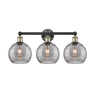 A thumbnail of the Innovations Lighting 616-3W 12 26 Athens Deco Swirl Vanity Black Antique Brass / Light Smoke Deco Swirl