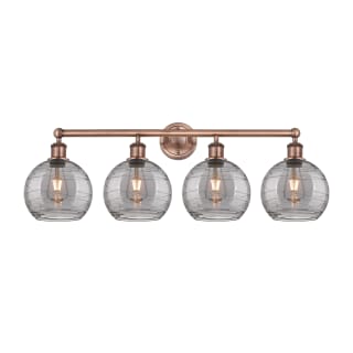 A thumbnail of the Innovations Lighting 616-4W 12 35 Athens Deco Swirl Vanity Antique Copper / Light Smoke Deco Swirl