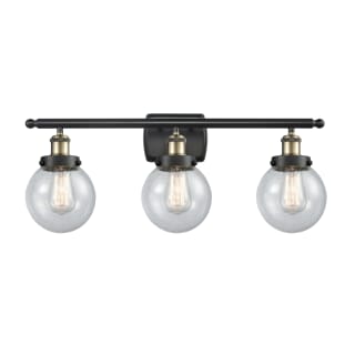 A thumbnail of the Innovations Lighting 916-3W-11-26 Beacon Vanity Black Antique Brass / Seedy