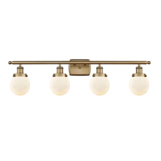 A thumbnail of the Innovations Lighting 916-4W-11-36 Beacon Vanity Brushed Brass / Matte White