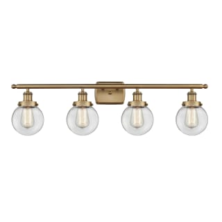 A thumbnail of the Innovations Lighting 916-4W-11-36 Beacon Vanity Brushed Brass / Clear