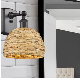 A thumbnail of the Innovations Lighting 516-1W-6-8 Woven Ratan Sconce Alternate Image