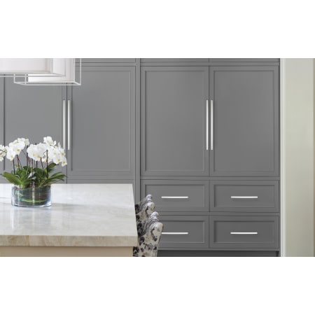 A large image of the Amerock BP26205 Amerock-BP26205-Polished Nickel on Gray Cabinets