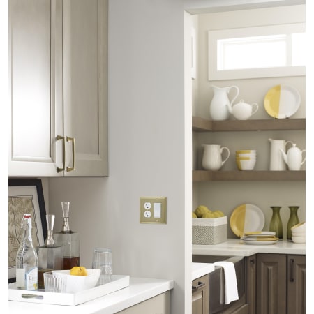 A large image of the Amerock BP36525 Amerock-BP36525-Golden Champagne on Gray Cabinets
