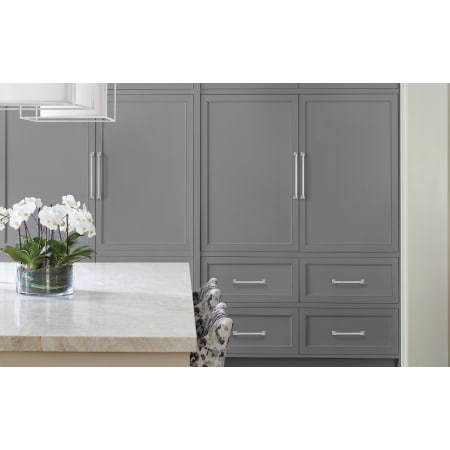 A large image of the Amerock BP53531 Amerock-BP53531-Polished Nickel on Gray Cabinets