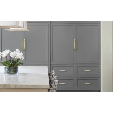 A large image of the Amerock BP55348 Amerock-BP55348-Golden Champagne on Gray Cabinets