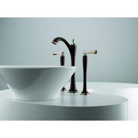 A large image of the Brizo 65485LF-LHP Brizo-65485LF-LHP-Installed Faucet in Cocoa Bronze/Polished Nickel