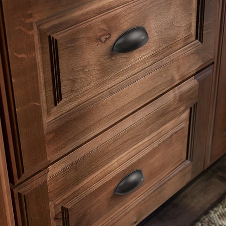 A large image of the Franklin Brass P34702-B Oil Rubbed Bronze Hardware on Natural Cabinetry