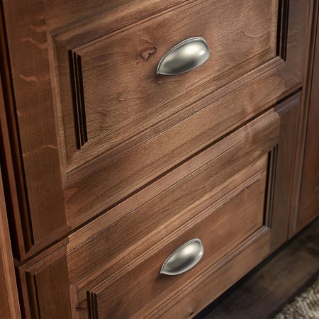 A large image of the Franklin Brass P34702-B Satin Nickel Hardware on Natural Cabinetry