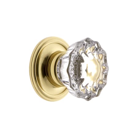 A large image of the Grandeur VERS-CRYS-KNOB-GEO Polished Brass