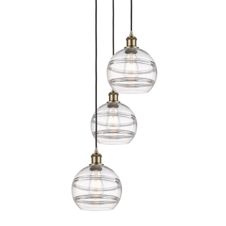 A large image of the Innovations Lighting 113B-3P-30-15 Rochester Pendant Antique Brass / Clear