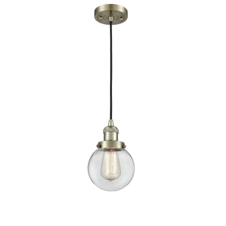 A large image of the Innovations Lighting 201C-6 Beacon Antique Brass / Clear