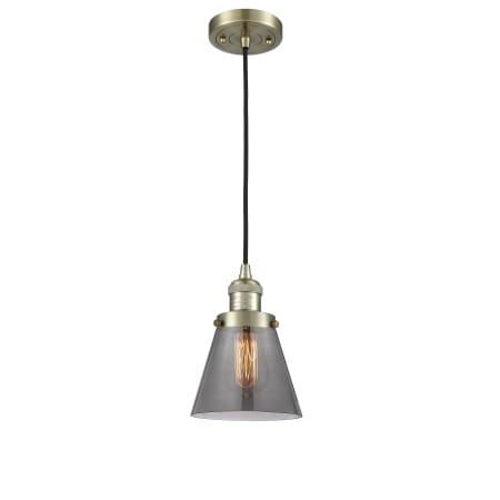 A large image of the Innovations Lighting 201C Small Cone Antique Brass / Smoked