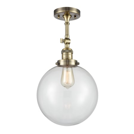 A large image of the Innovations Lighting 201F X-Large Beacon Antique Brass / Clear