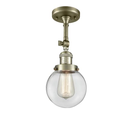 A large image of the Innovations Lighting 201F-6 Beacon Antique Brass / Clear
