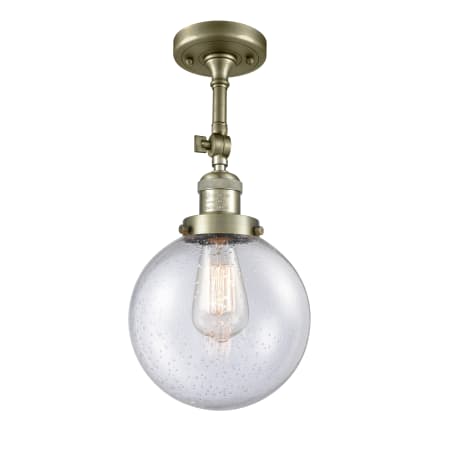 A large image of the Innovations Lighting 201F-8 Beacon Antique Brass / Seedy
