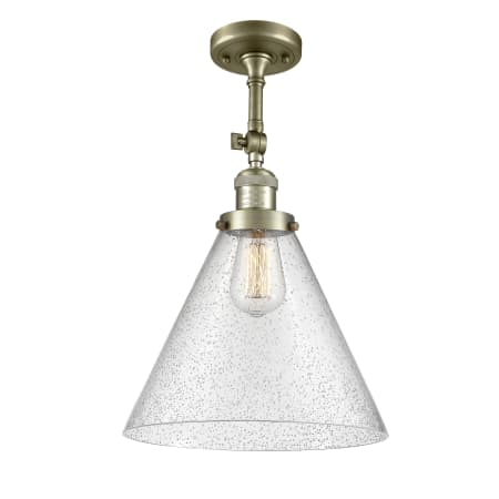 A large image of the Innovations Lighting 201F X-Large Cone Antique Brass / Seedy
