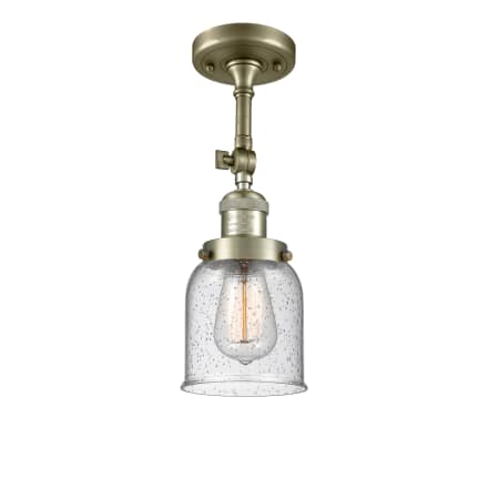 A large image of the Innovations Lighting 201F Small Bell Antique Brass / Seedy