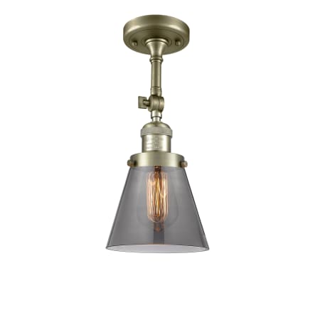 A large image of the Innovations Lighting 201F Small Cone Antique Brass / Smoked