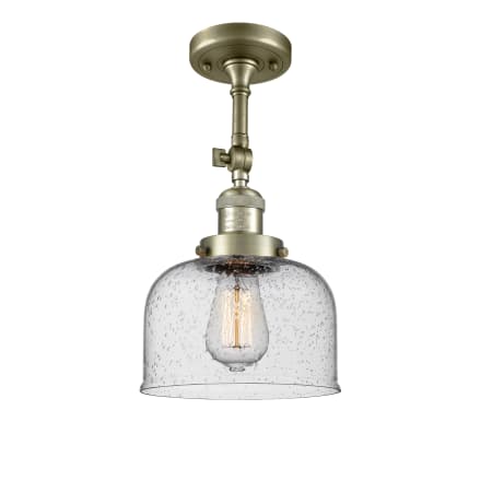 A large image of the Innovations Lighting 201F Large Bell Antique Brass / Seedy