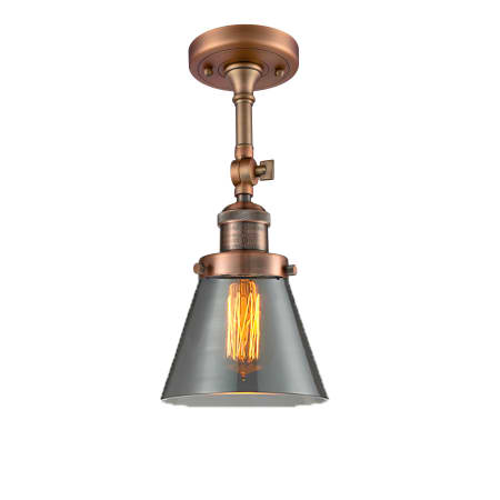A large image of the Innovations Lighting 201F Small Cone Antique Copper / Smoked