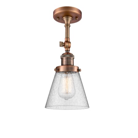 A large image of the Innovations Lighting 201F Small Cone Antique Copper / Seedy