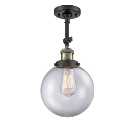 A large image of the Innovations Lighting 201F-8 Beacon Black Antique Brass / Clear