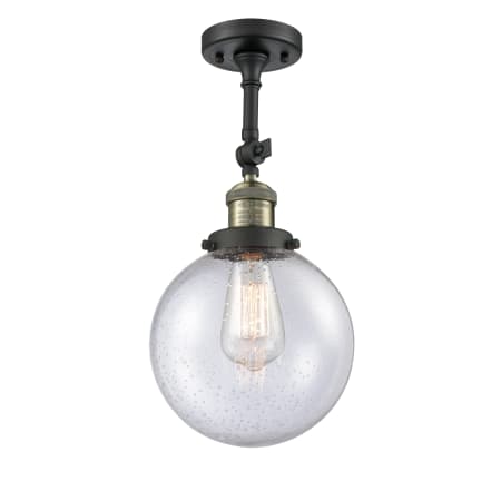 A large image of the Innovations Lighting 201F-8 Beacon Black Antique Brass / Seedy