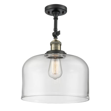 A large image of the Innovations Lighting 201F X-Large Bell Black Antique Brass / Clear