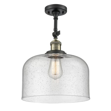 A large image of the Innovations Lighting 201F X-Large Bell Black Antique Brass / Seedy