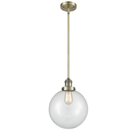 A large image of the Innovations Lighting 201S X-Large Beacon Antique Brass / Clear