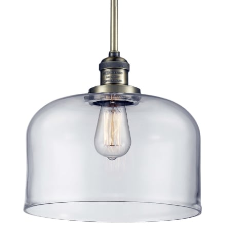 A large image of the Innovations Lighting 201S X-Large Bell Antique Brass / Clear