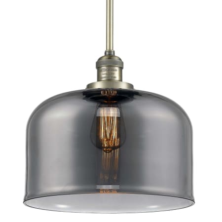 A large image of the Innovations Lighting 201S X-Large Bell Antique Brass / Plated Smoked