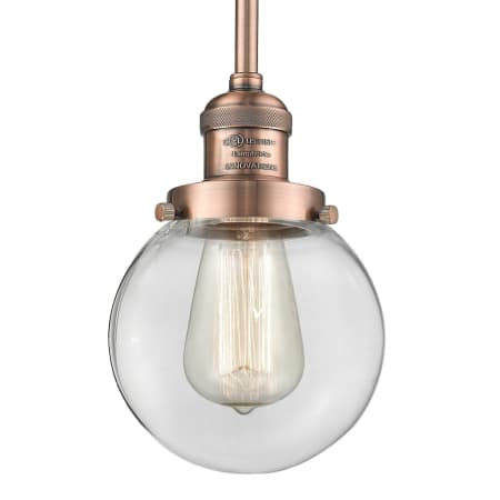 A large image of the Innovations Lighting 201S-6 Beacon Antique Copper / Clear