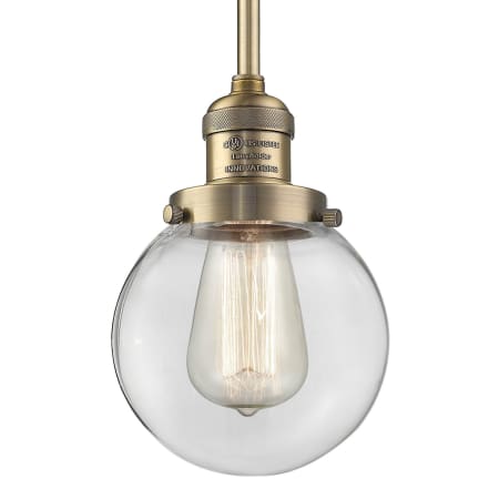 A large image of the Innovations Lighting 201S-6 Beacon Brushed Brass / Clear