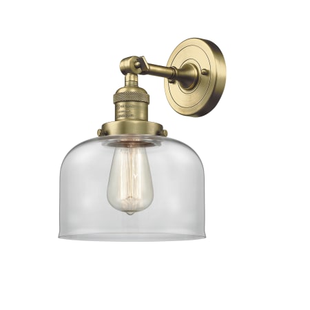 A large image of the Innovations Lighting 203 Large Bell Antique Brass / Clear