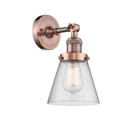 A large image of the Innovations Lighting 203 Small Cone Antique Copper / Seedy