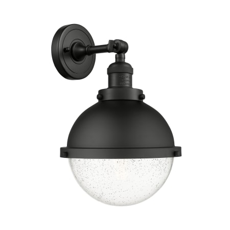 A large image of the Innovations Lighting 203-12-9 Hampden Sconce Matte Black / Seedy