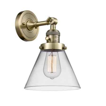 A large image of the Innovations Lighting 203SW Large Cone Antique Brass / Clear