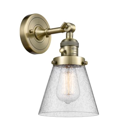 A large image of the Innovations Lighting 203SW Small Cone Antique Brass / Seedy
