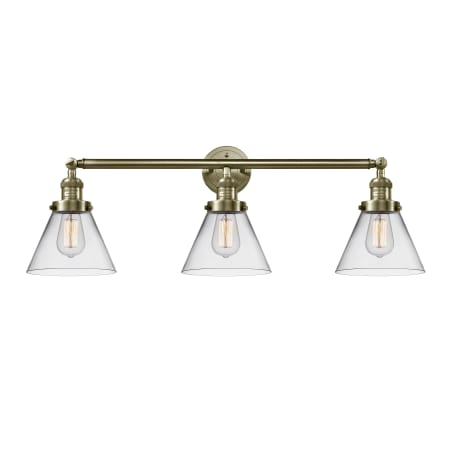 A large image of the Innovations Lighting 205-S Large Cone Antique Brass / Clear