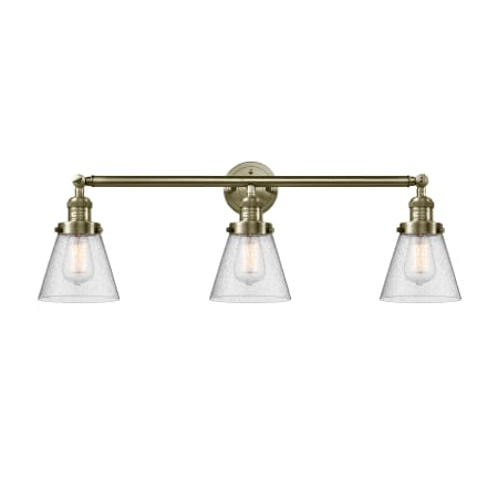 A large image of the Innovations Lighting 205-S Small Cone Antique Brass / Seedy