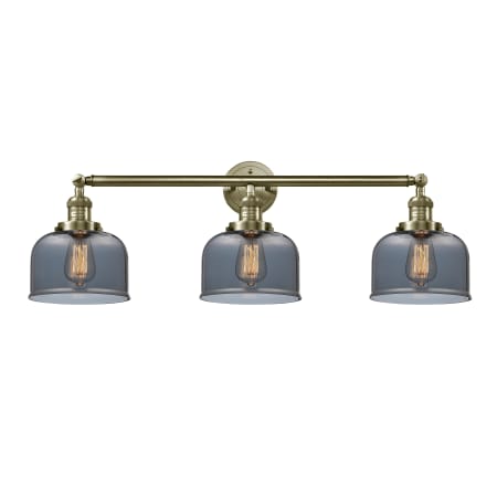 A large image of the Innovations Lighting 205-S Large Bell Antique Brass / Smoke