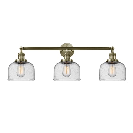 A large image of the Innovations Lighting 205-S Large Bell Antique Brass / Seedy