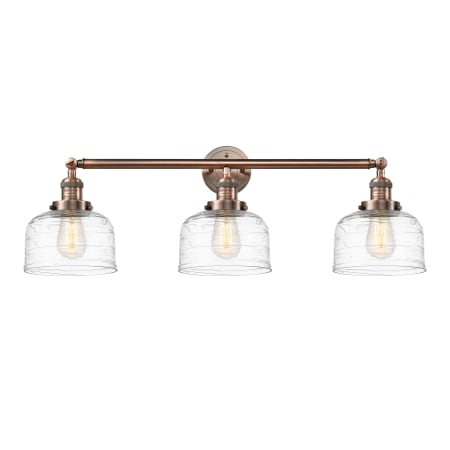 A large image of the Innovations Lighting 205-11-32 Bell Vanity Antique Copper / Clear Deco Swirl